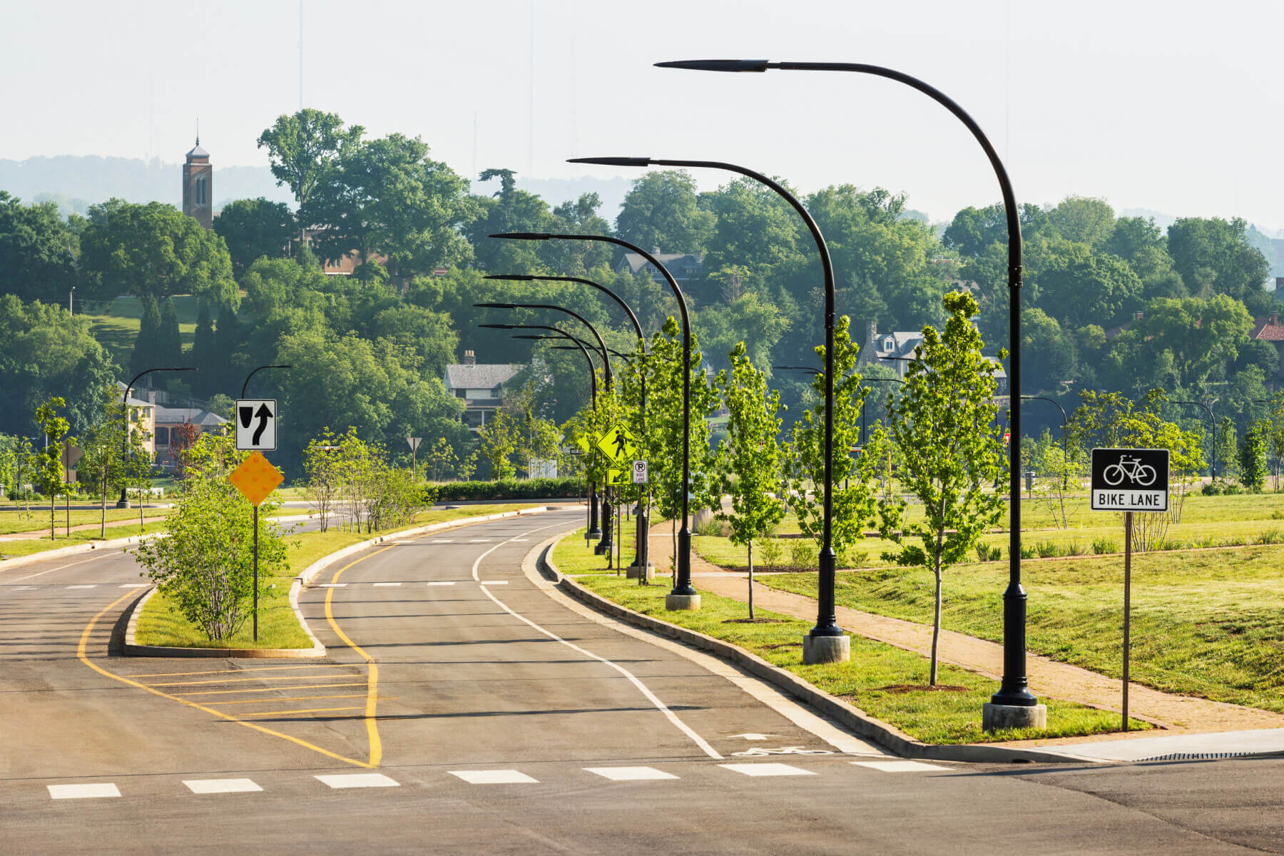 a street with street lights and trees