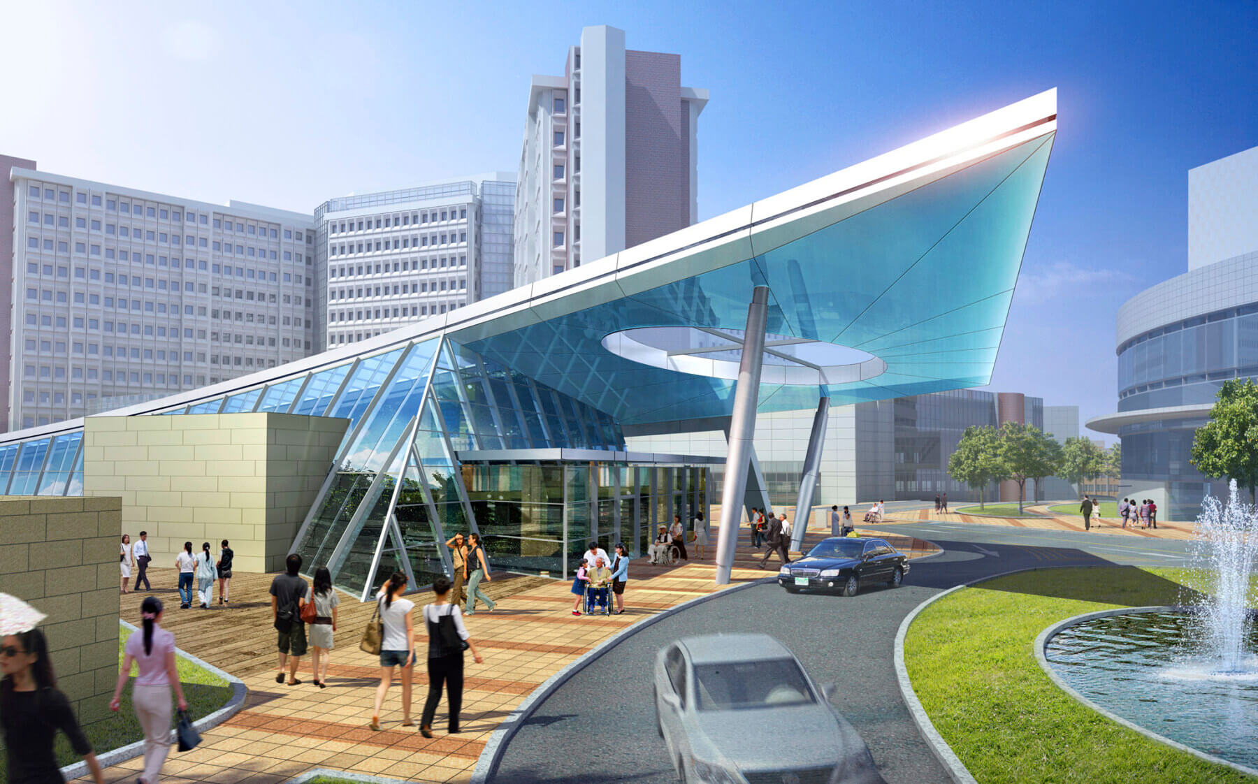 covered drop off area at entrance to glass building