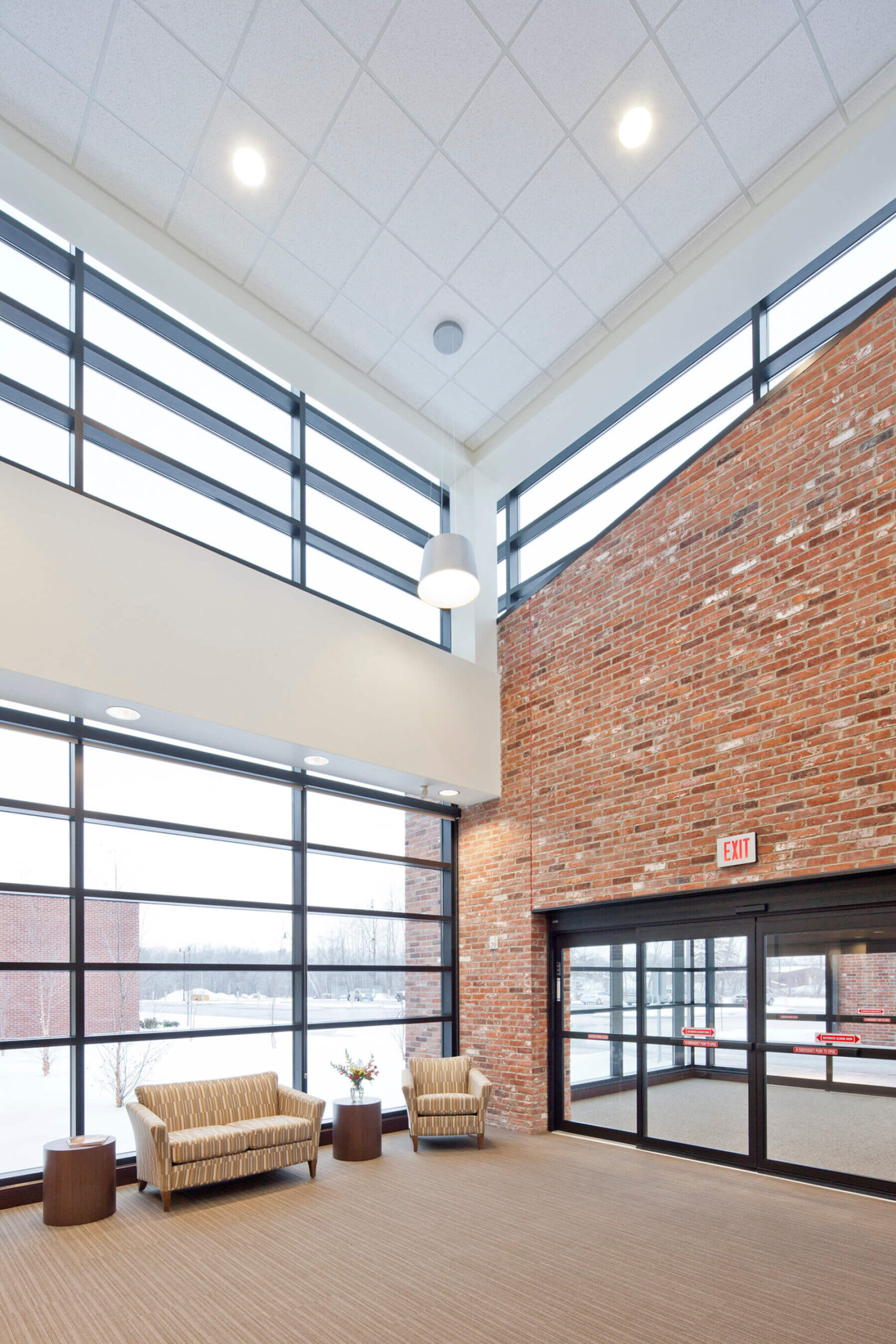 brick wall inside lobby of rehab hospital