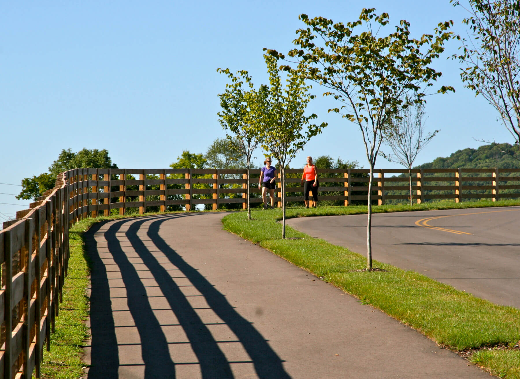 People walking on a path at Marcella Vivrette Smith Park
