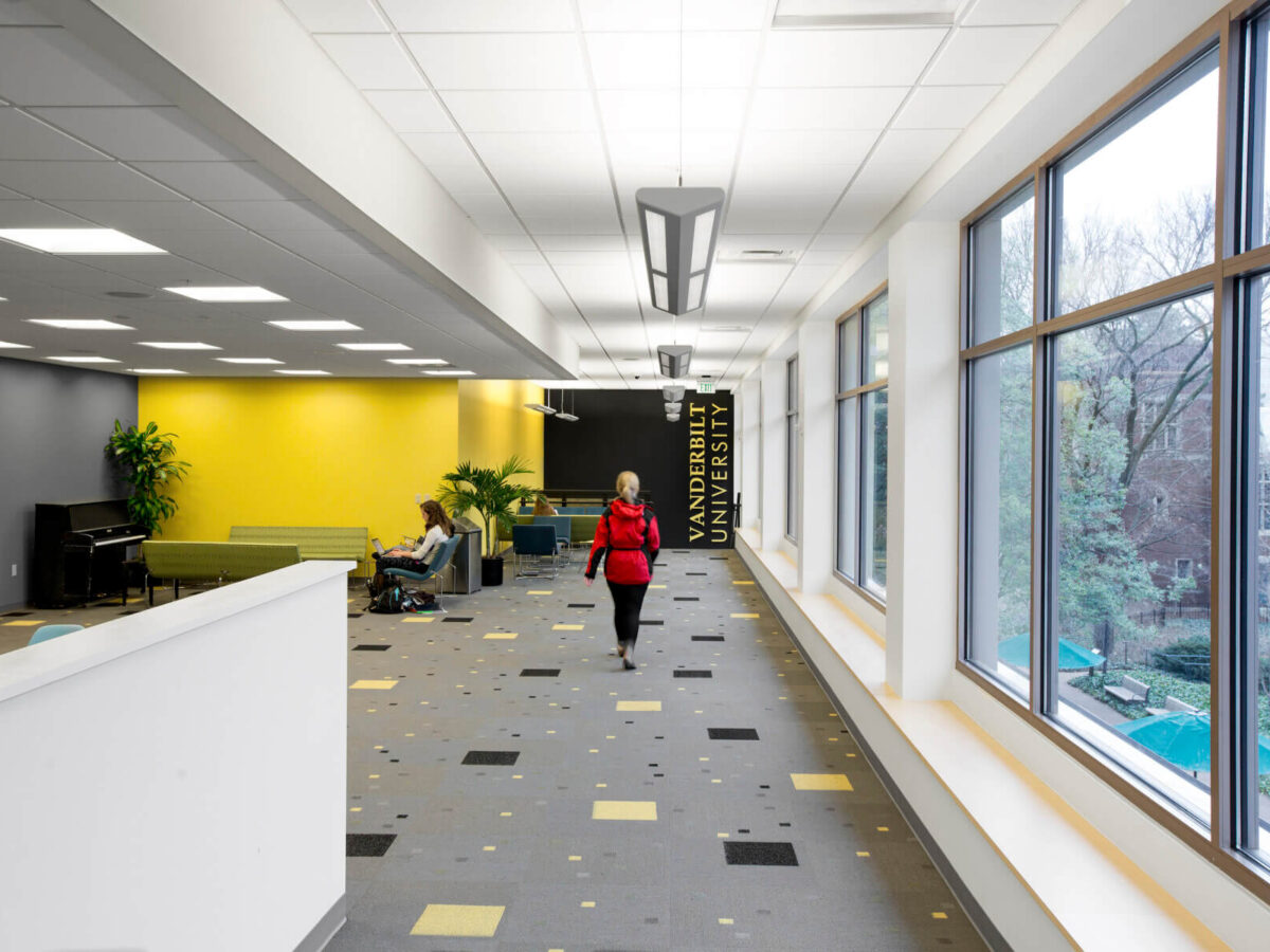 Student walking through study area in Vanderbilt University student center