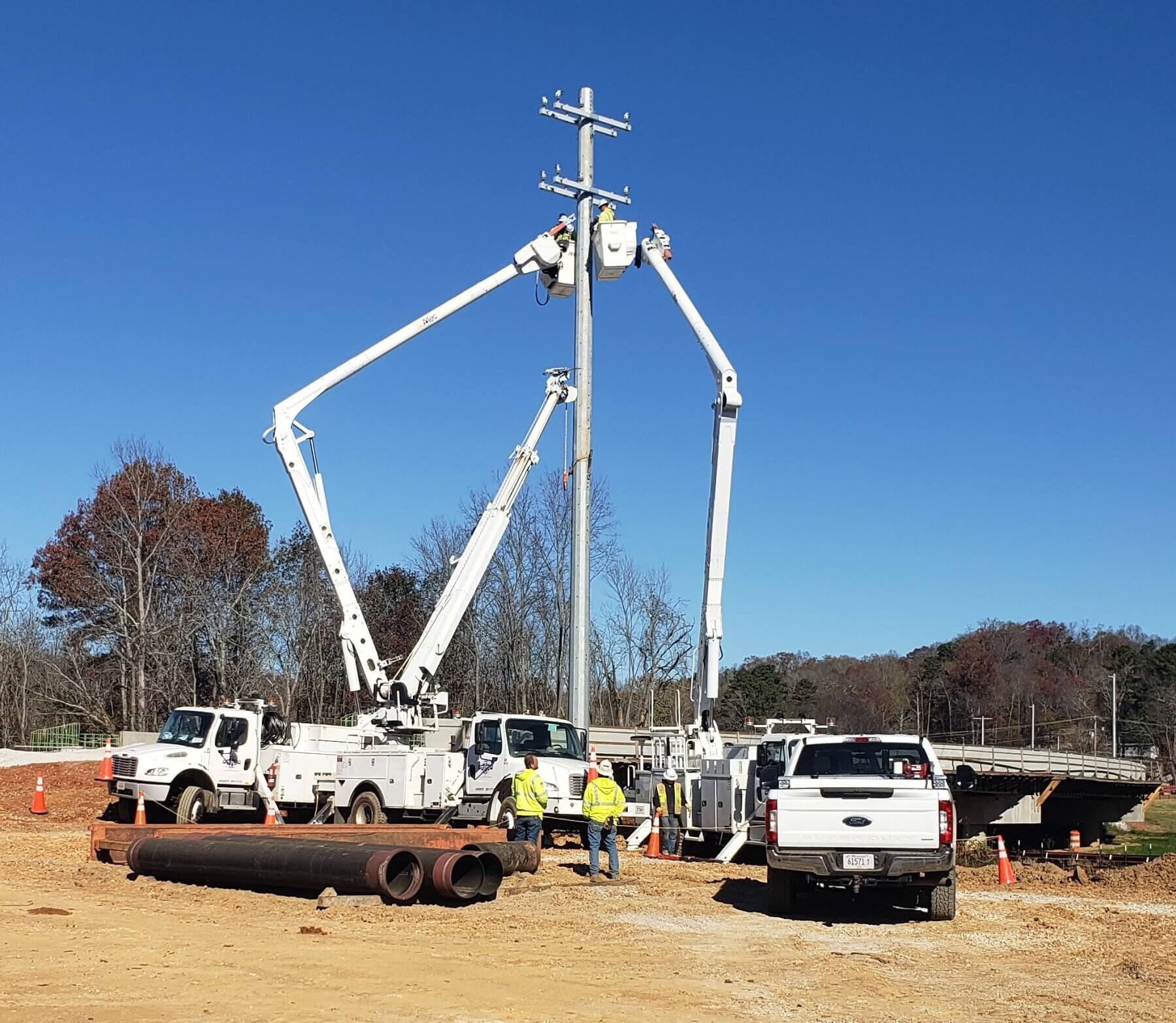 utility trucks at Apison Pike