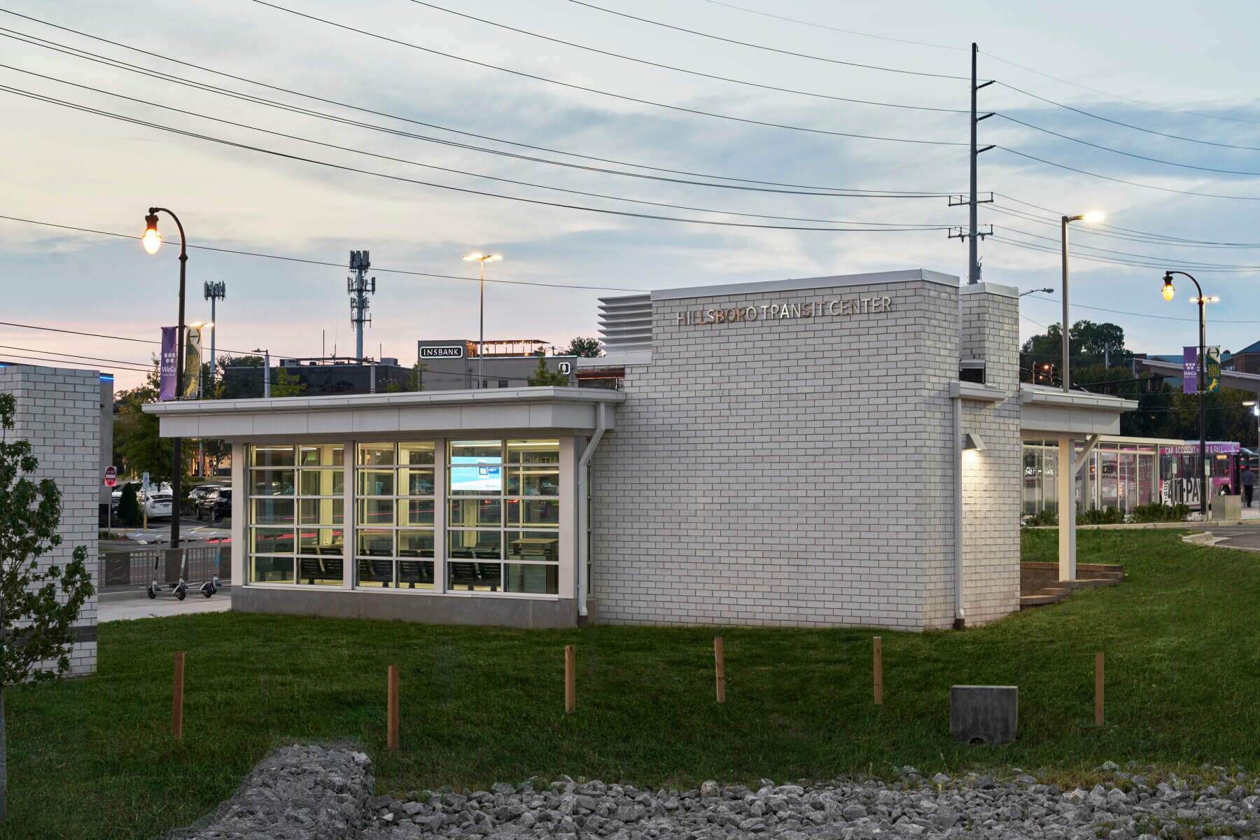 A transit center and grass in front of Hillsboro High School