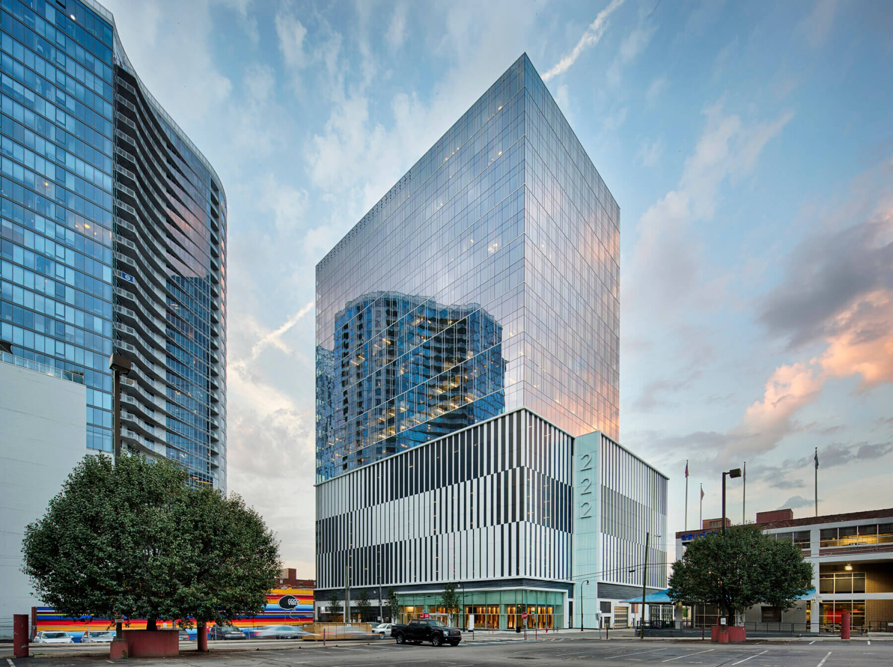 the exterior of 222 Second Avenue South with a parking lot in front