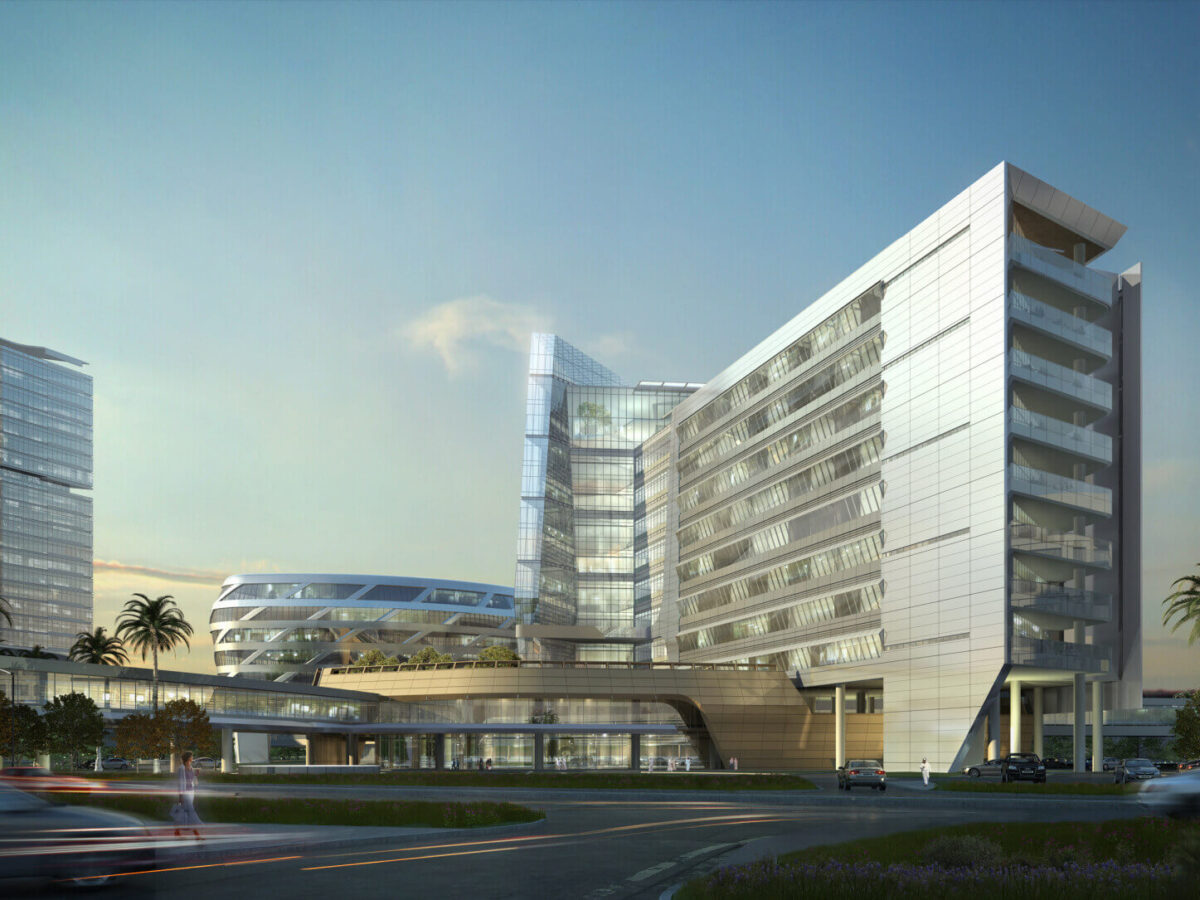 the exterior of the hospital at dusk
