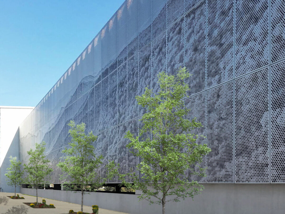 the perforated metal screen on the outside of Asheville Regional Airport’s three-story parking garage