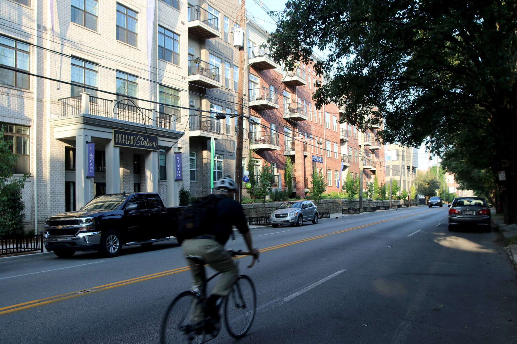 a biker in front of Heritage Station