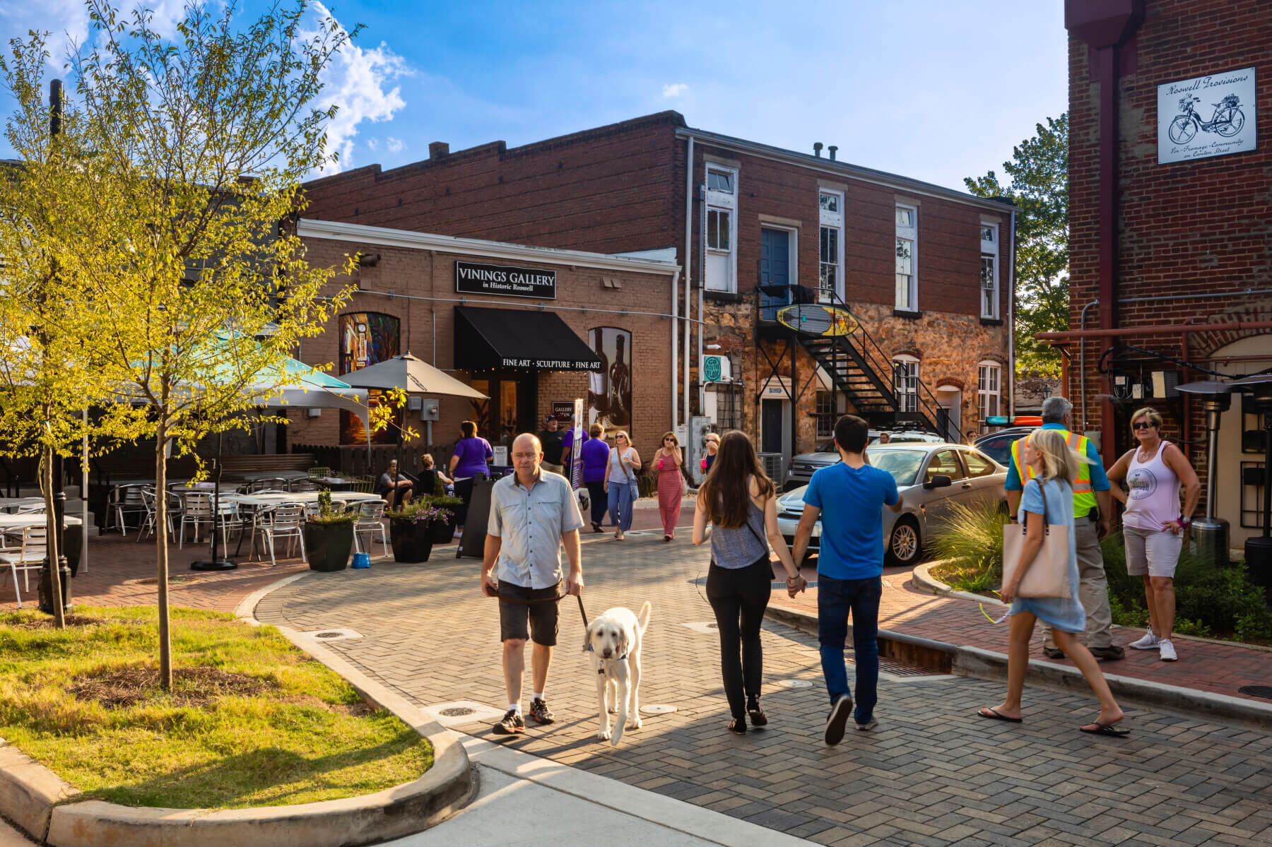people enjoying the revitalized alley in Roswell