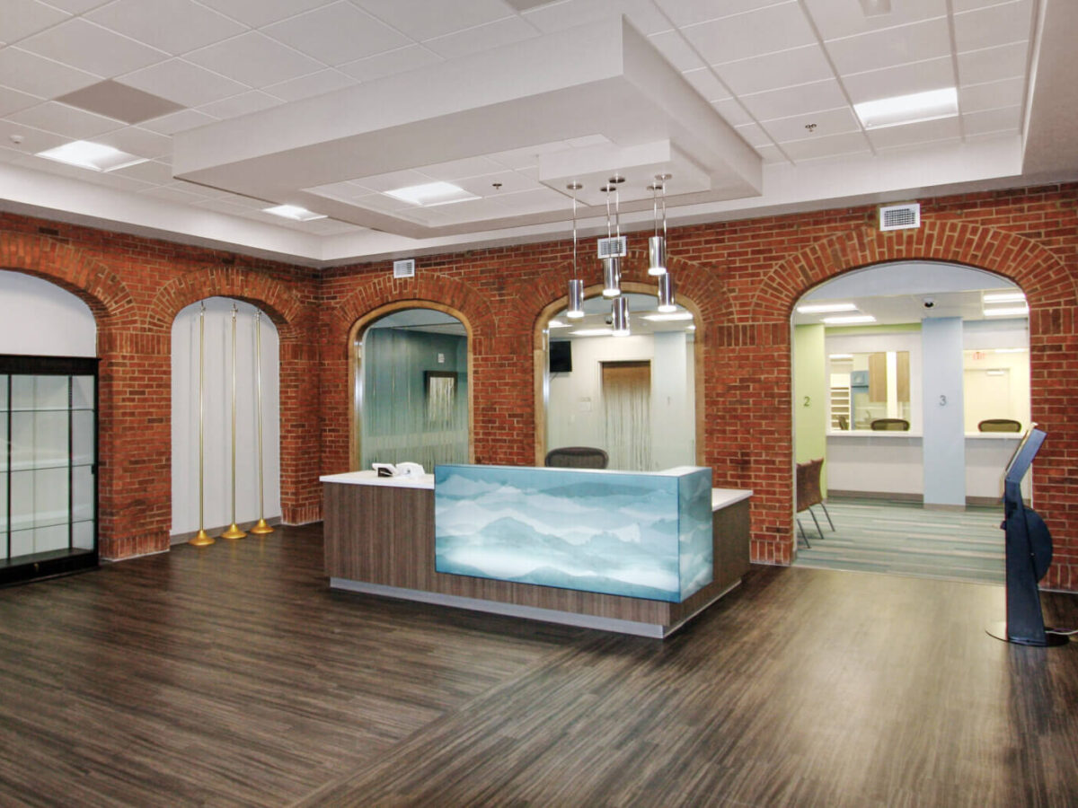 the main lobby and reception desk in the health clinic