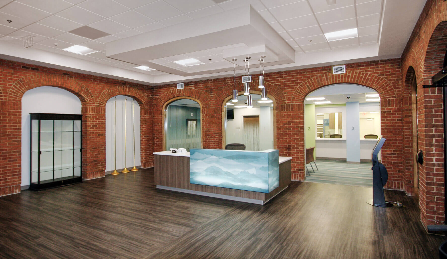 the main lobby and reception desk in the health clinic