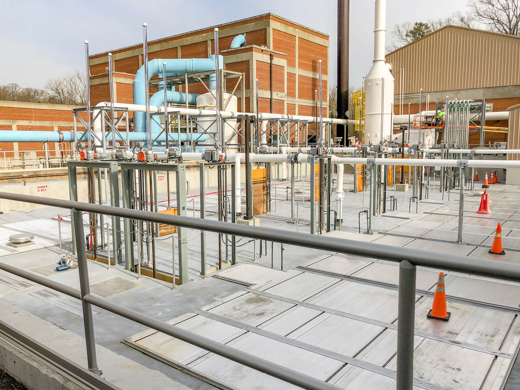 Exterior image of RM Clayton WRC’s headworks facility with orange cones.