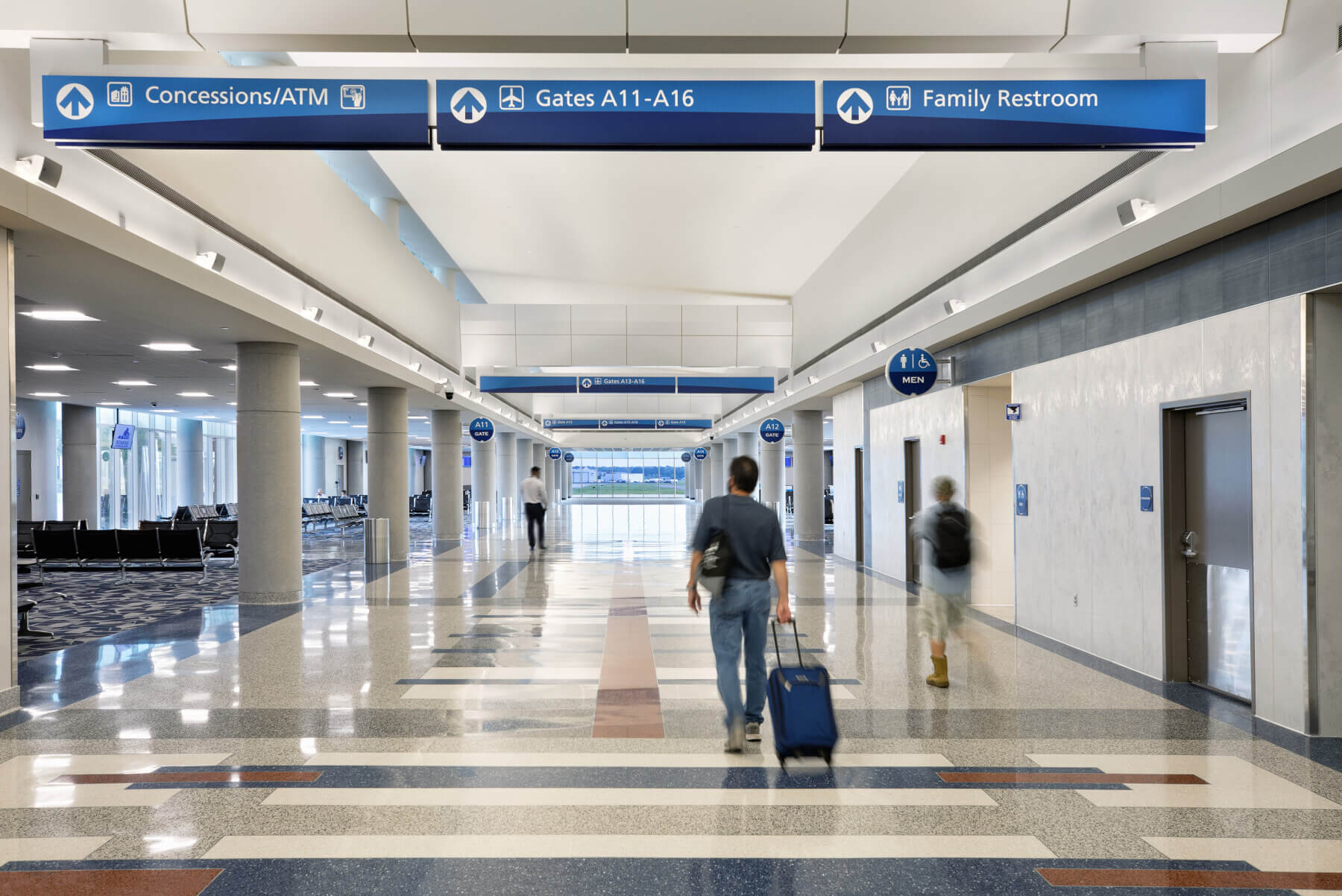 passengers waking down the concourse in terminal A at Richmond International Airport