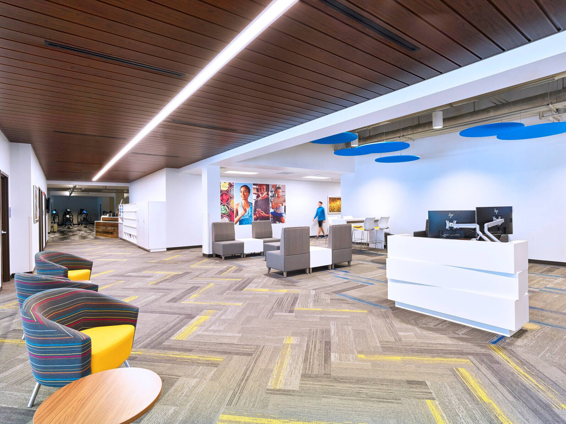waiting area with seating and a help desk