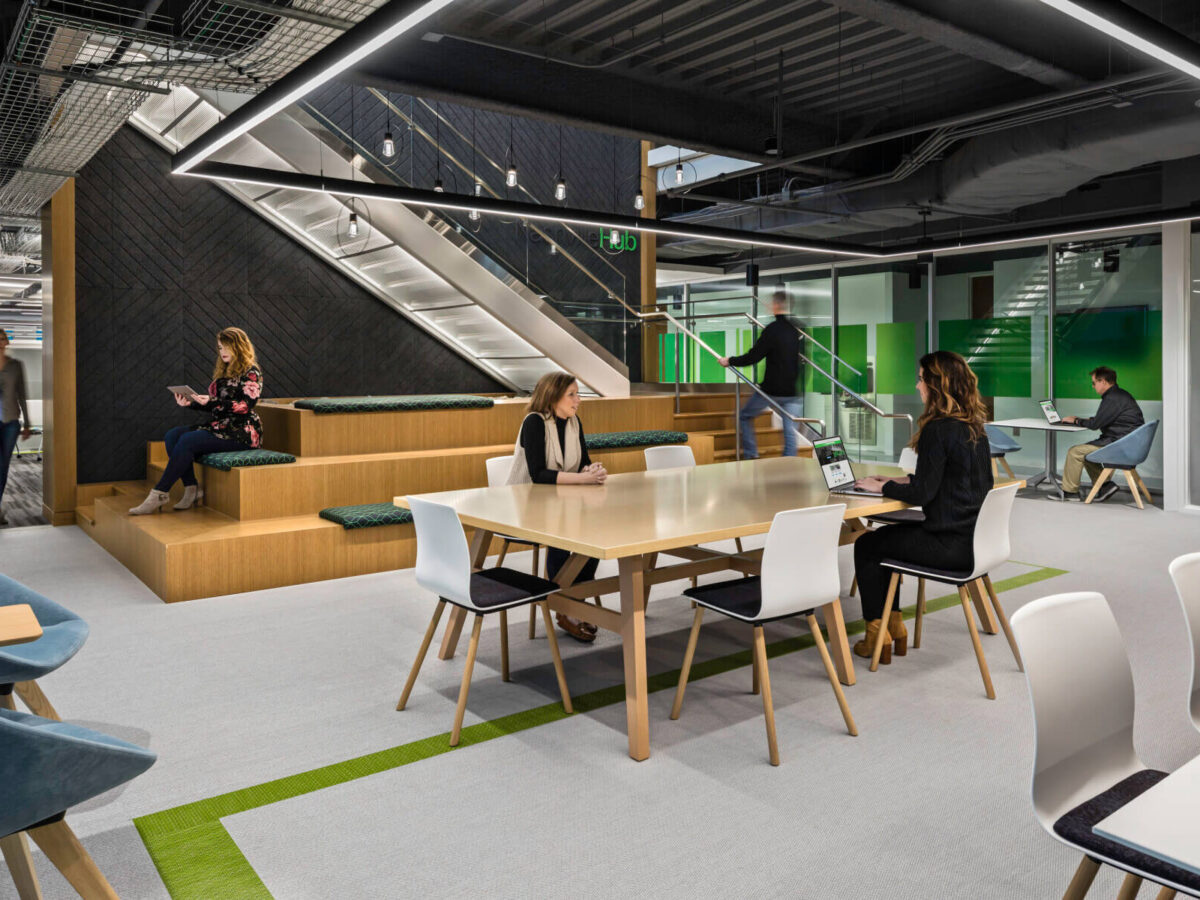 a connecting stair with a big table in the Schneider Electric Offices