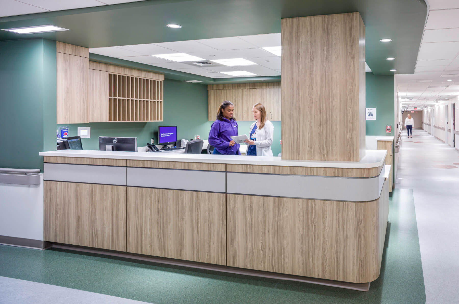 two nurses at a nurse station