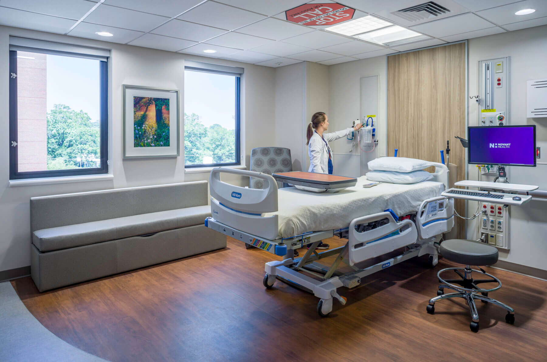 nurse in patient room