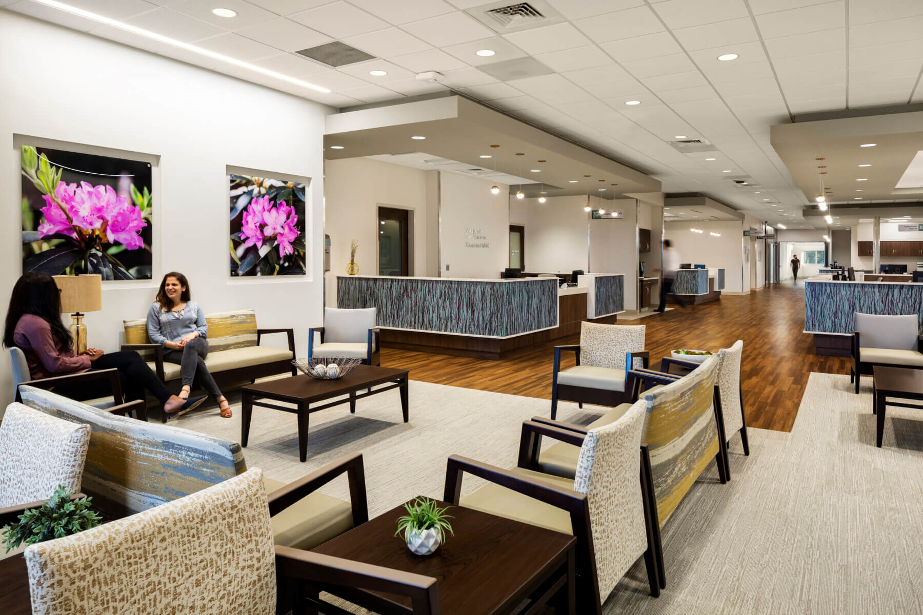 women seated while waiting at the women’s imaging center