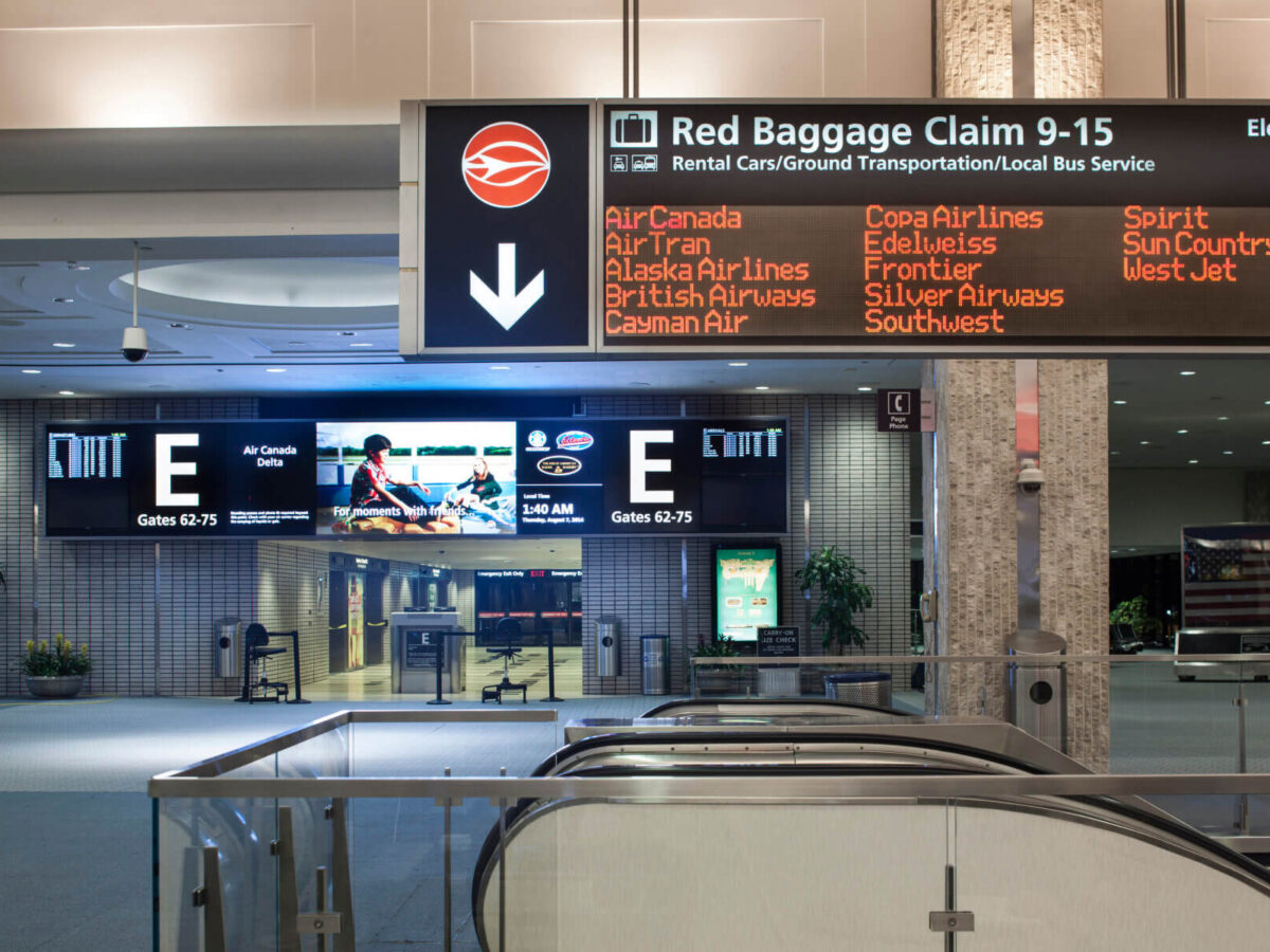 directional signage in the main terminal at Tampa International Airport