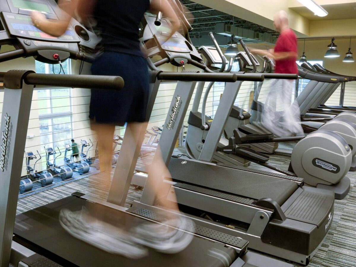 patients running on treadmills at the Brooks Rehabilitation Center