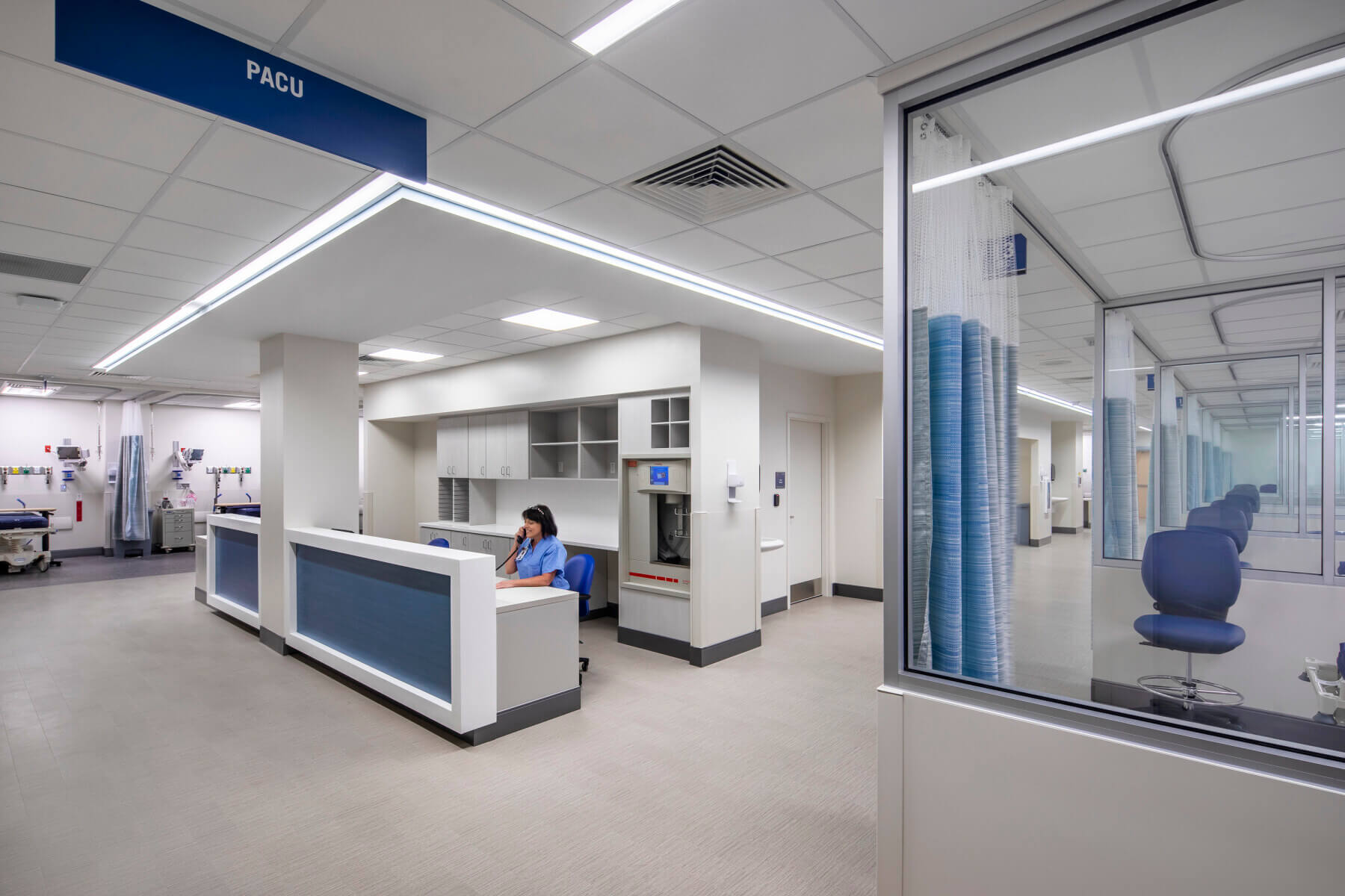 nurse station and patient beds in the post anesthesia care unit