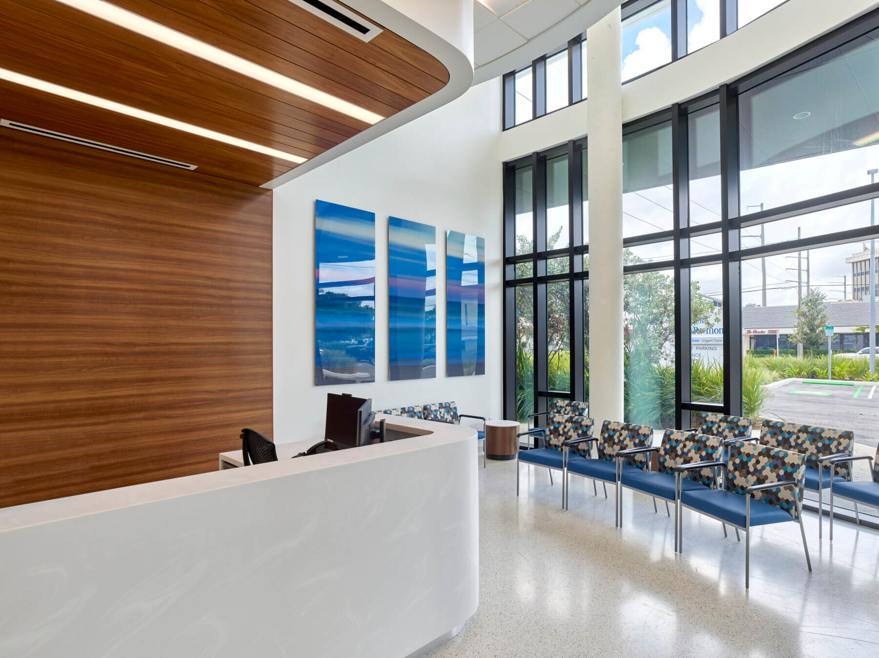 registration desk and waiting area with chairs