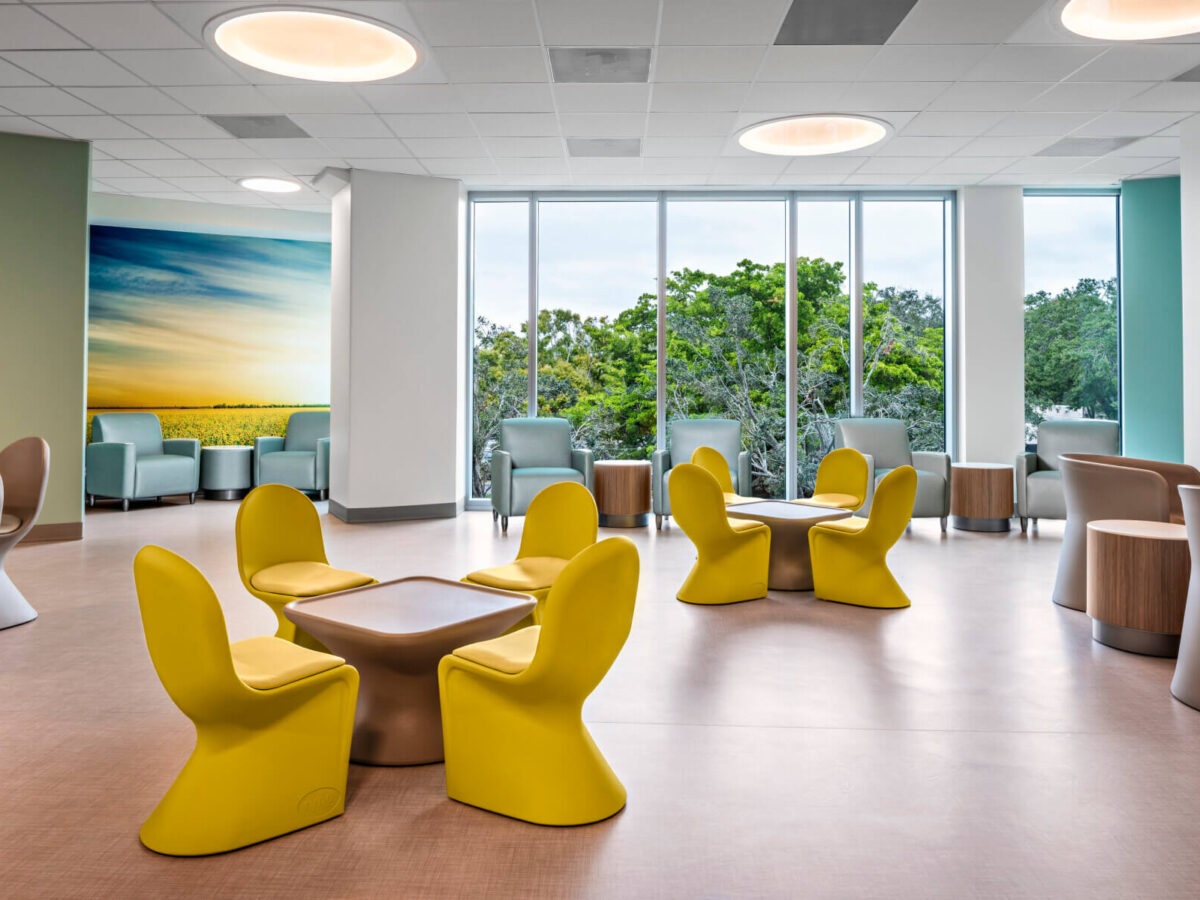 tables and chairs in the group common room at the behavioral health pavilion building at Sarasota Memorial Hospital