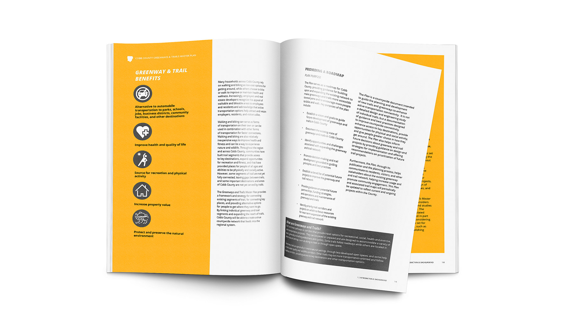 a greenway master plan book laid open to a page of recommendations
