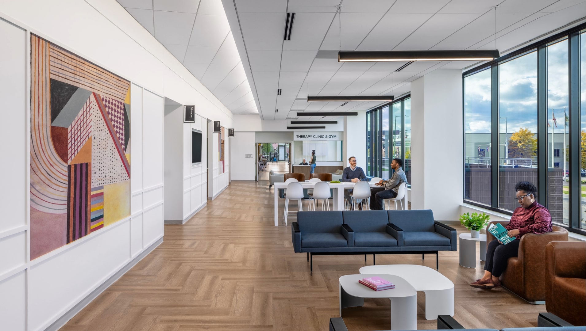 Bright, welcoming waiting room at Cooper Green Mercy Health Ambulatory Care Facility featuring natural light and comfortable seating.
