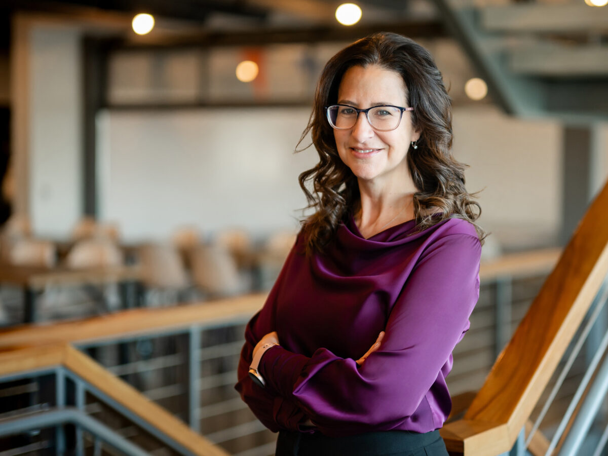 Headshot of Corie Baker, AIA, LEED AP BD+C, EDAC, WELL AP, Fitwel Ambassador