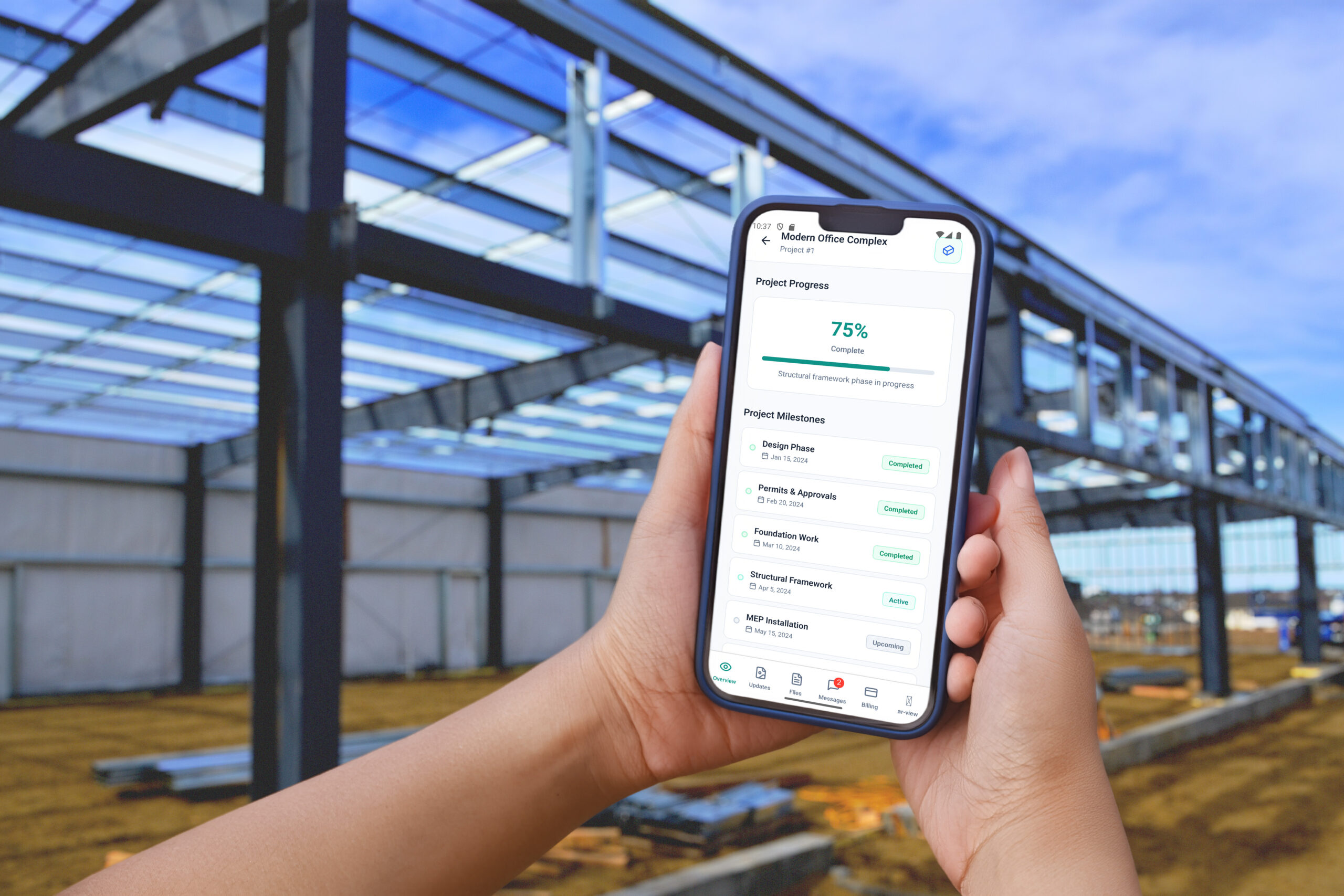 Close up of hands holding smartphone with blank screen on construction site in the background.